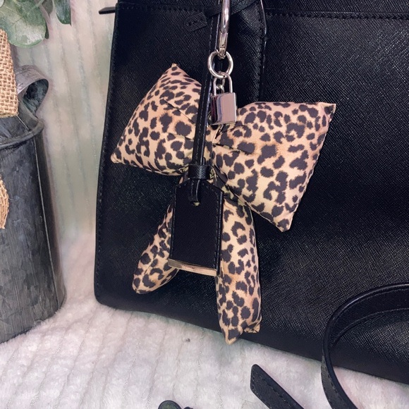 Kate Spade Black Satchel with Leopard Bow comes with crossbody strap - Picture 3 of 7